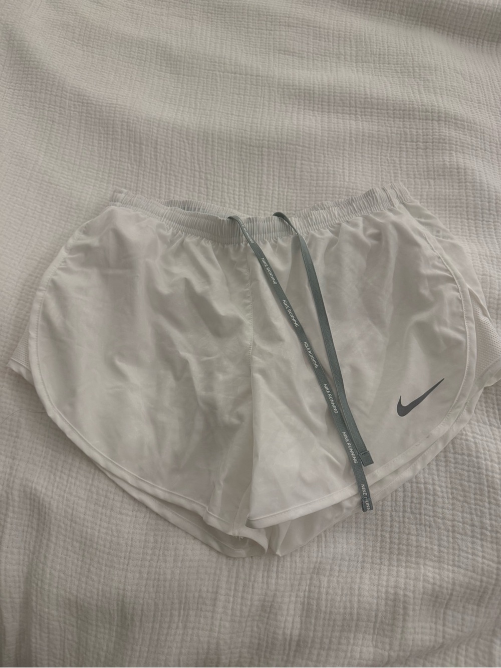 Nike White Athletic Running Shorts with Gray Swoosh and Drawstring